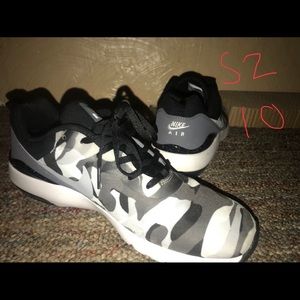 Lightly warn white and black Nike airs size 10